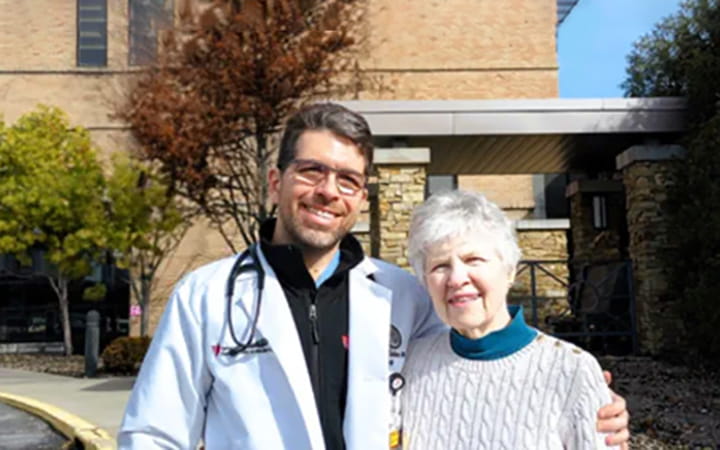 Janet Bender (right) with Luis Augusto Palma Dallan, MD, PhD, Medical Director, Cardiac Catheterization Laboratory, UH Samaritan Medical Center