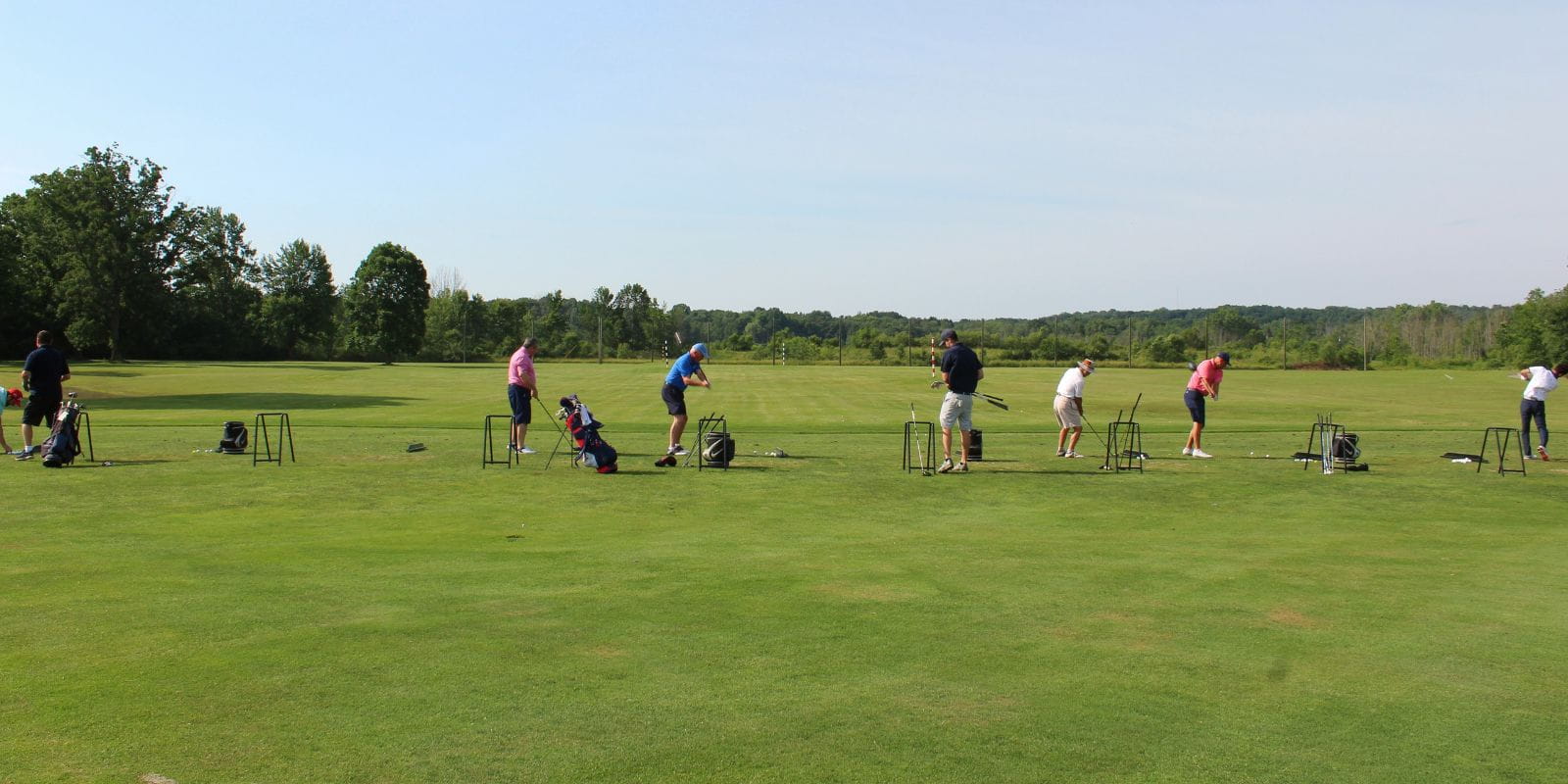 Lake Golf Event Golfers Line Up Tee Driving.