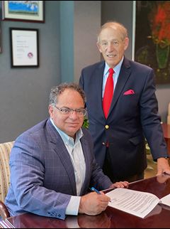 Dr. Cliff Megerian and Michael Feuer